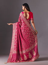 Rani pink dola silk saree with bandhani zari elegance