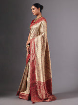 Beige shimmer dola silk saree with floral zari artistry
