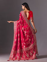 Rani pink satin silk saree with luxurious zari embellishments