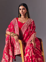 Rani pink satin silk saree with luxurious zari embellishments