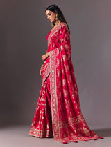 Rani pink satin silk saree with luxurious zari embellishments