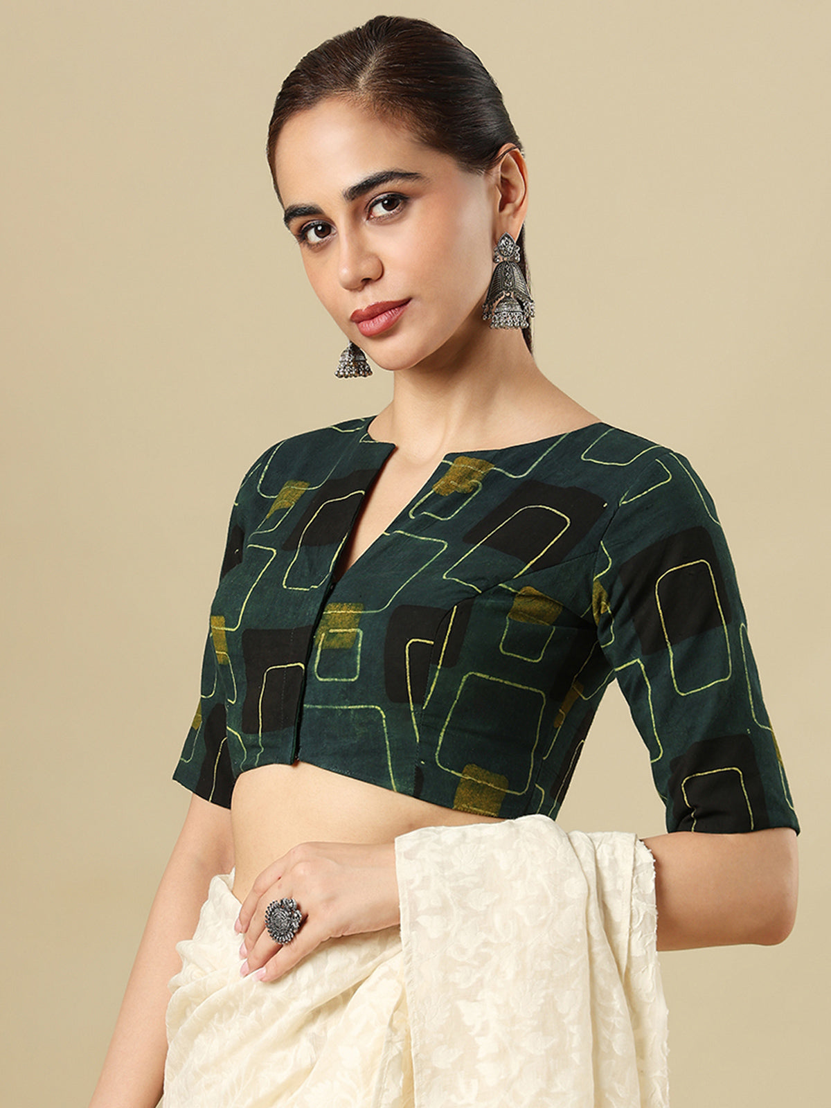 Green cotton printed blouse with boat neckline and elbow sleeves