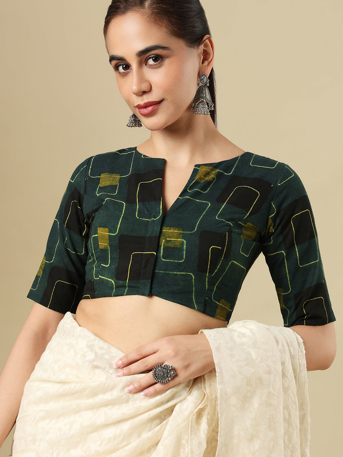 Green cotton printed blouse with boat neckline and elbow sleeves