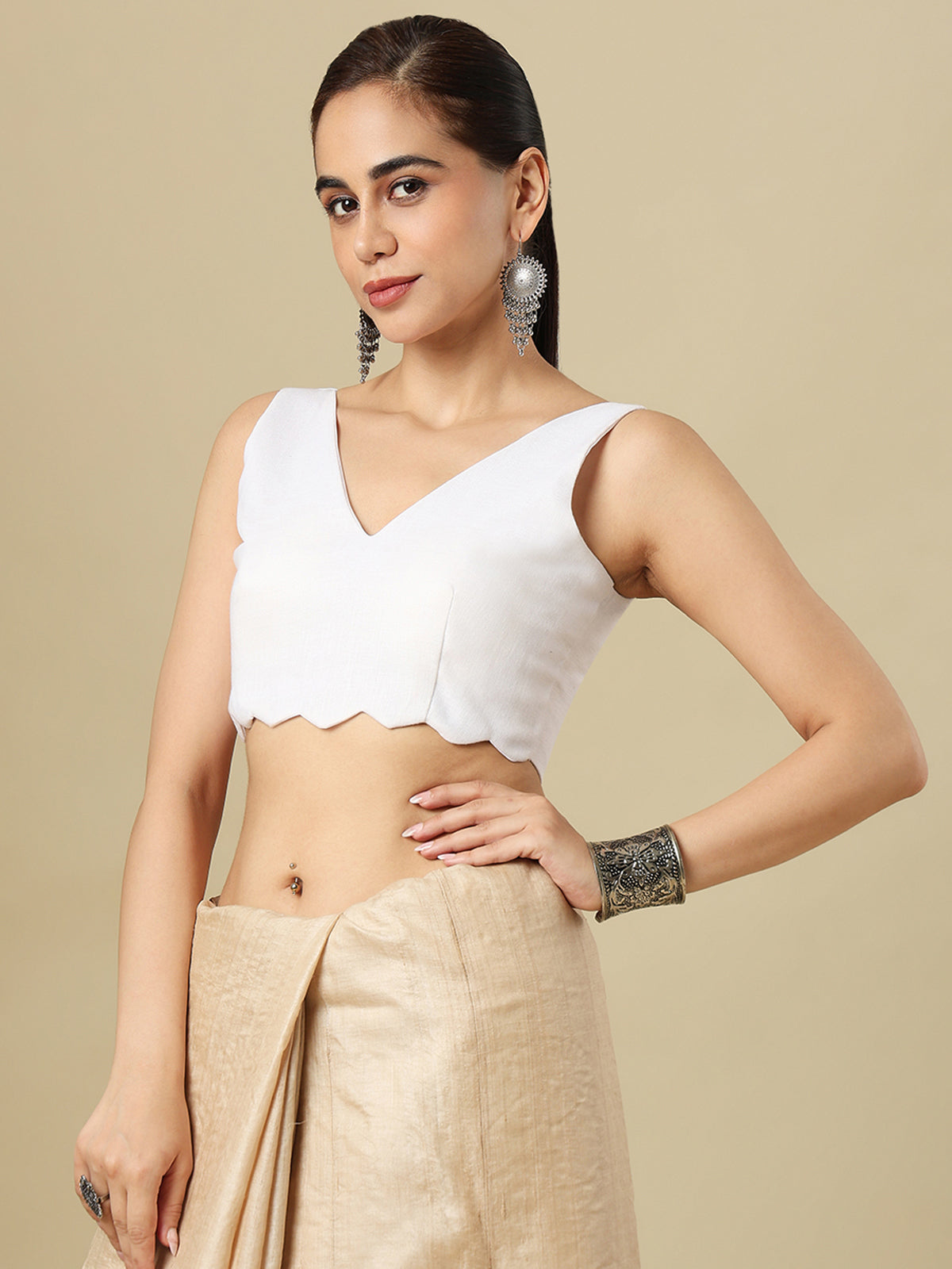 White linen solid blouse with V neck and sleeveless silhouette