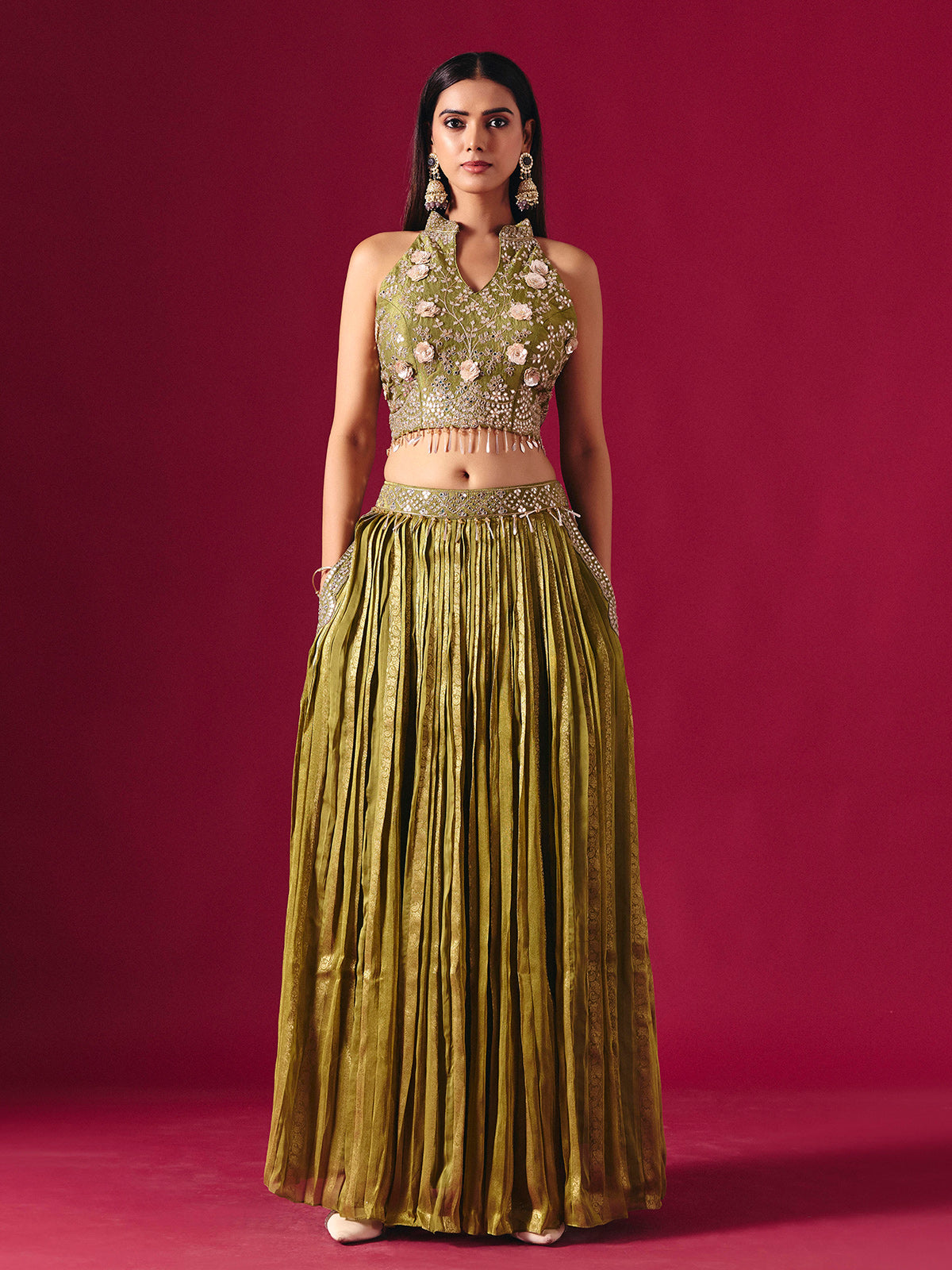 Olive green tissue silk lehenga choli with mirror and zari embellishments