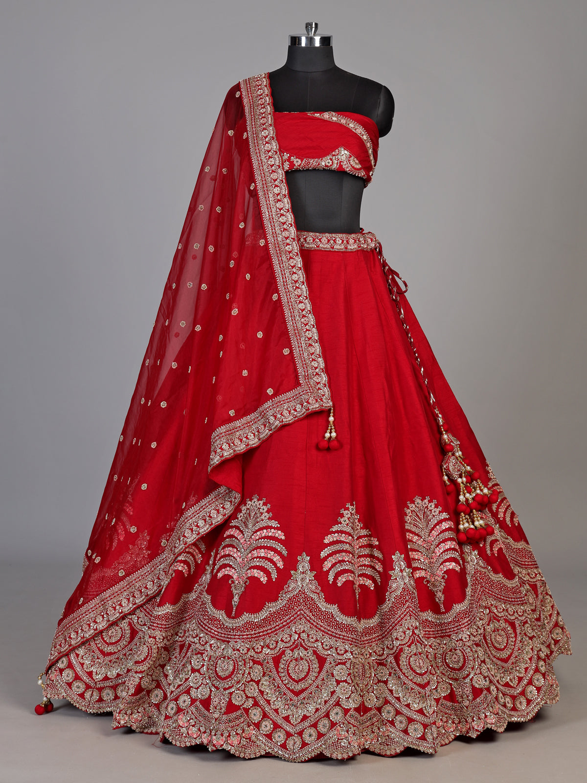 Red raw silk unstitched lehenga choli with intricate zardosi detailing