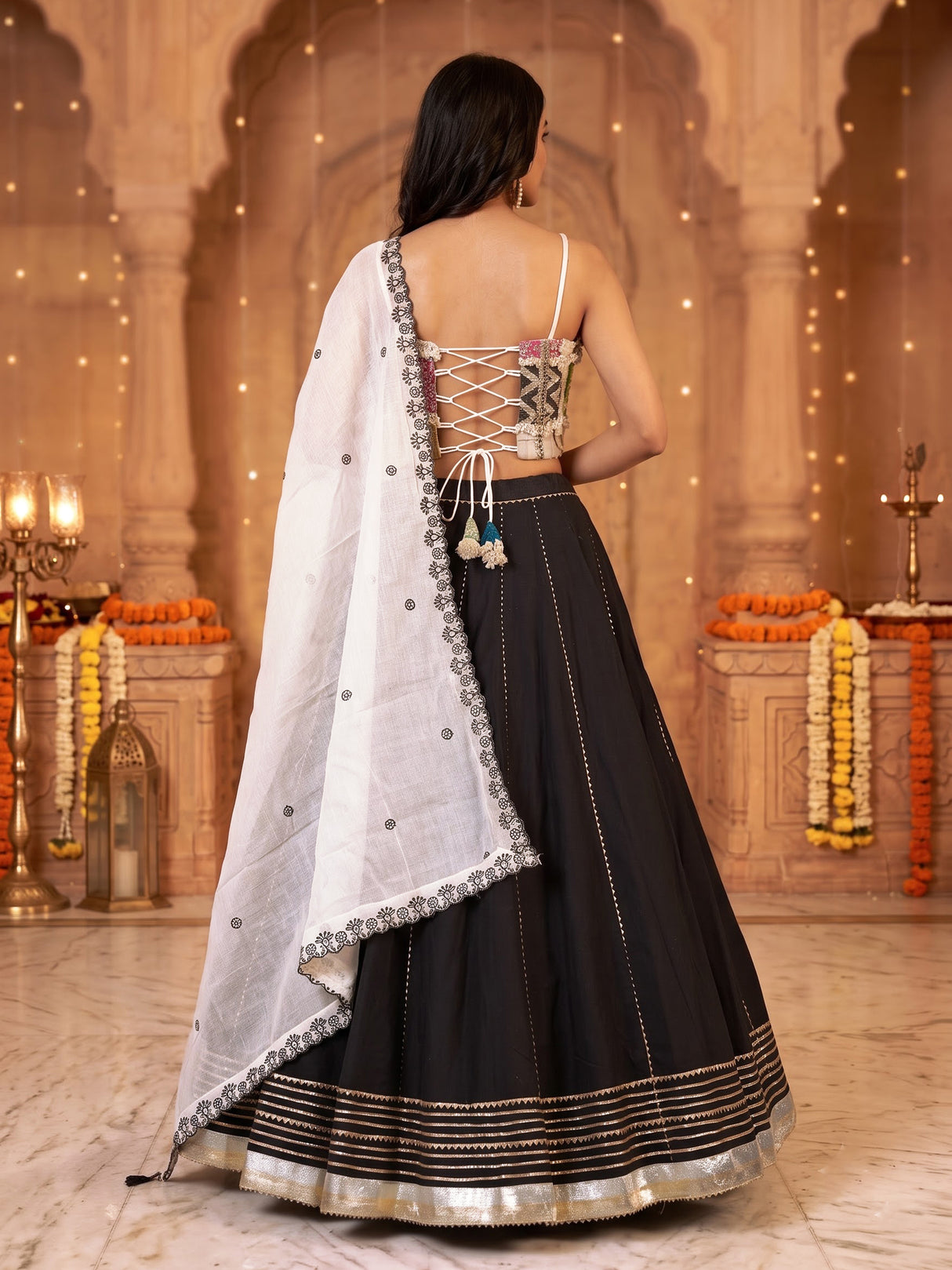 Black cotton silk blend lehenga choli with exquisite gota embellishments