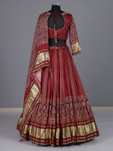Maroon gajji silk lehenga choli with regal festive embellishments