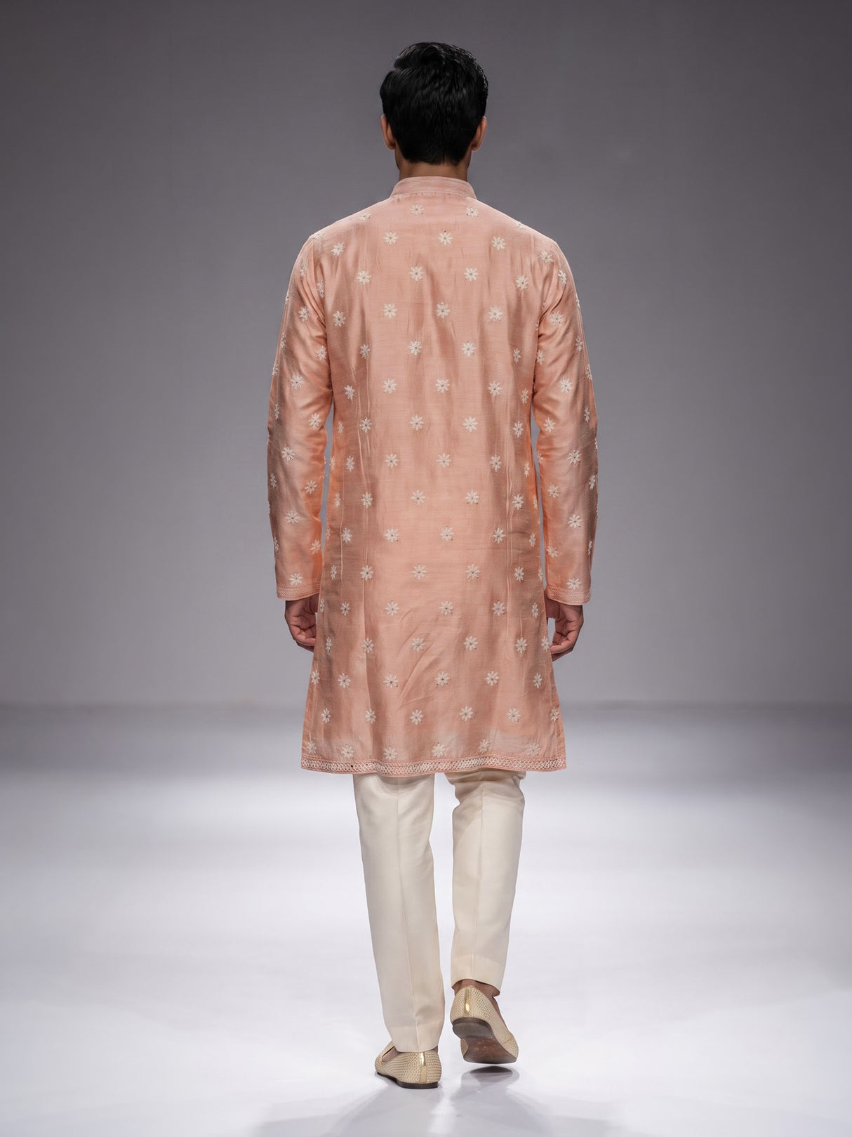Peach raw silk mens kurta suit with intricate sequin and butti work