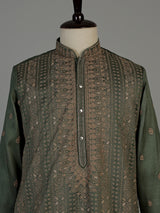 Green silk blend mens kurta suit with intricate butti detailing