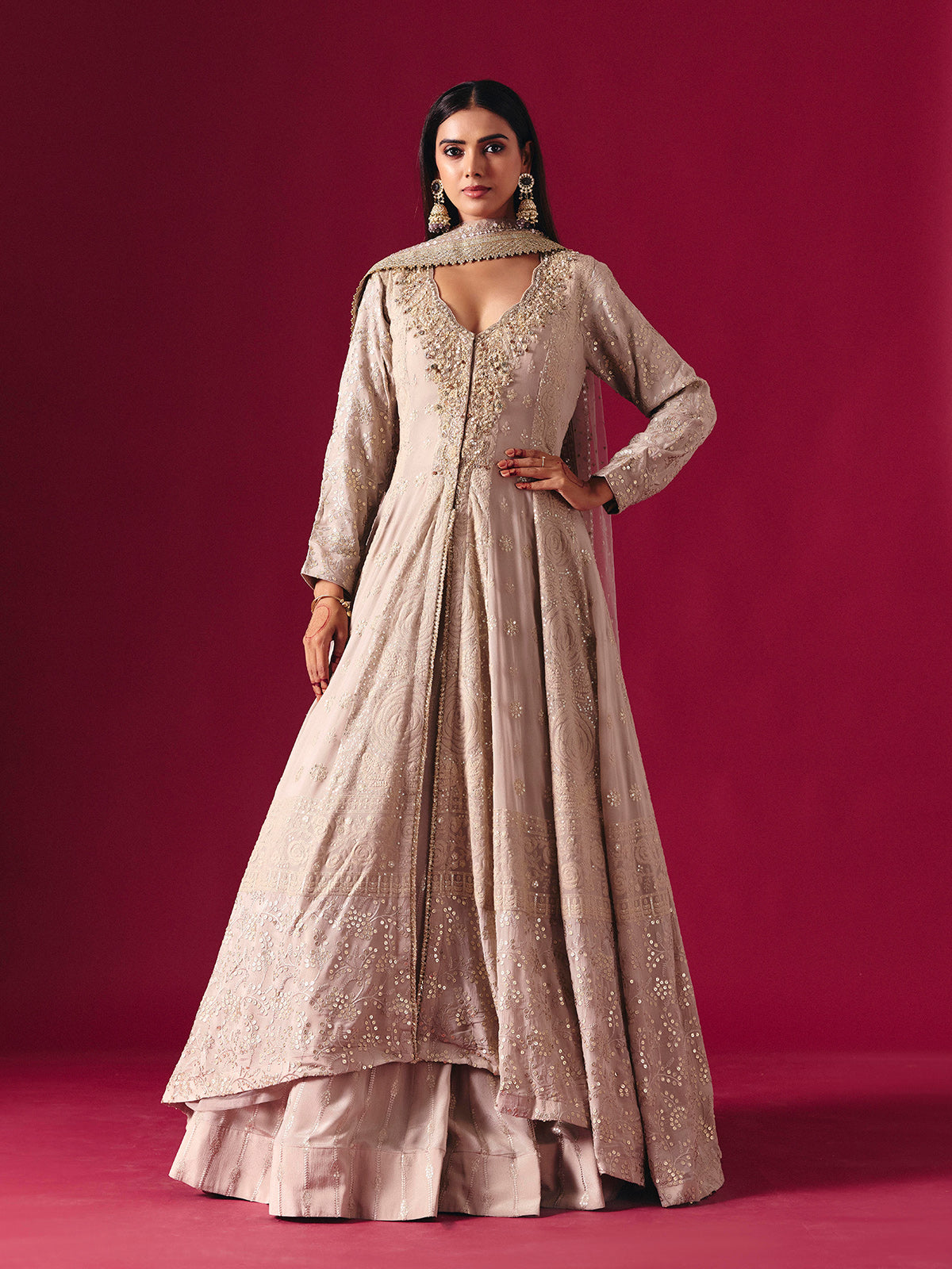 Elegant beige georgette salwar suit with embellished lehenga and dupatta
