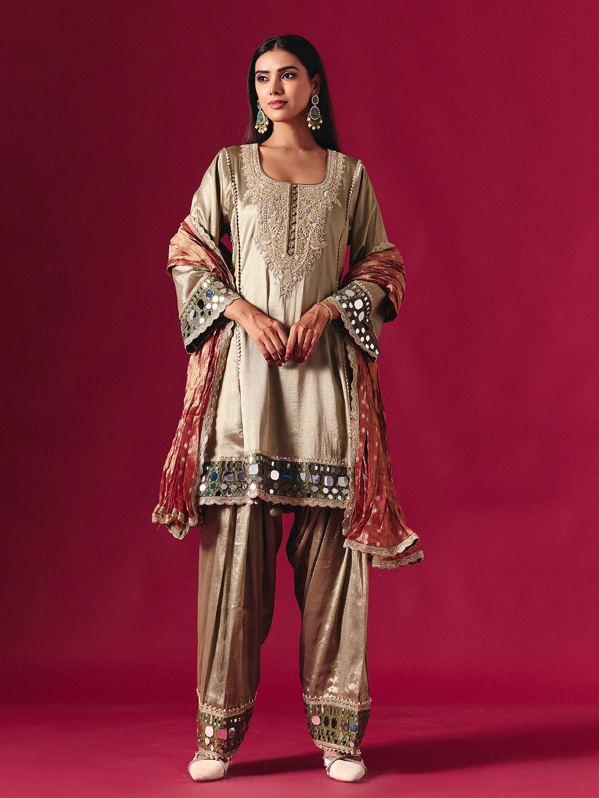 Regal gold silk salwar suit with zardosi embellished dupatta elegance