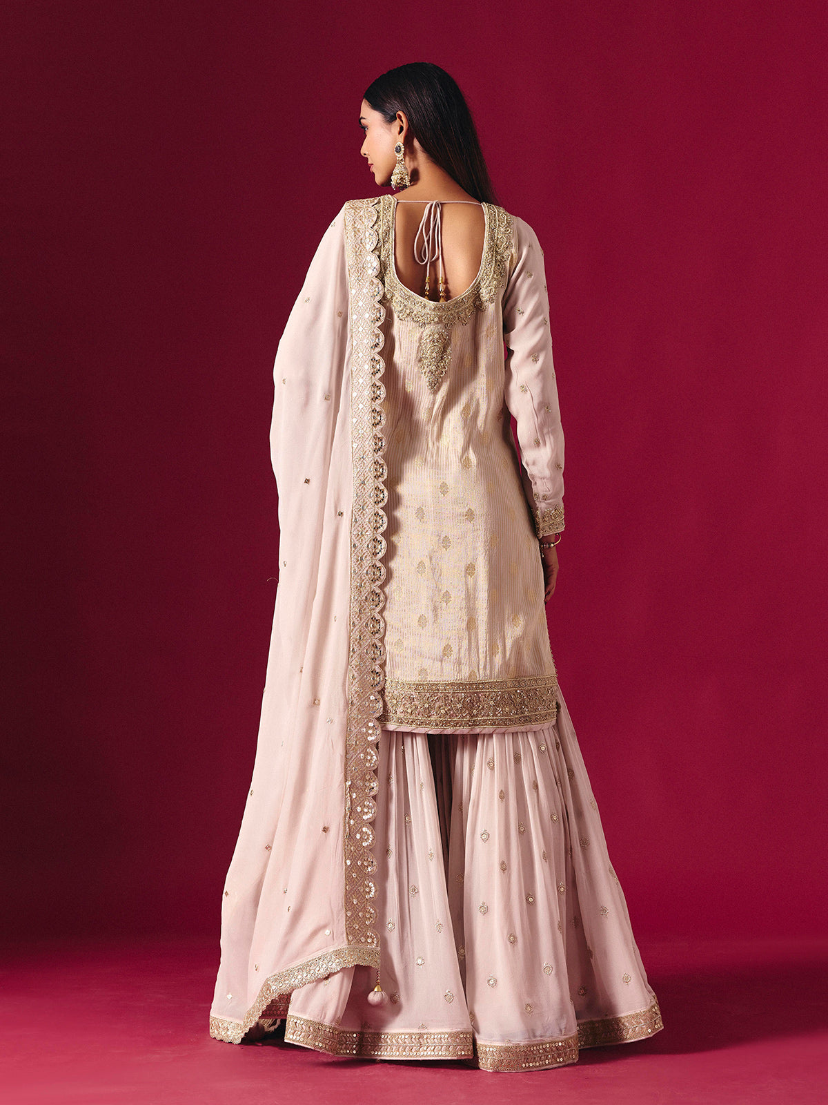 Light pink silk sharara suit with zari embellished elegance