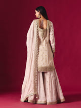 Light pink silk sharara suit with zari embellished elegance