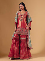 Pastel peach silk sharara suit with cutdana embellishments