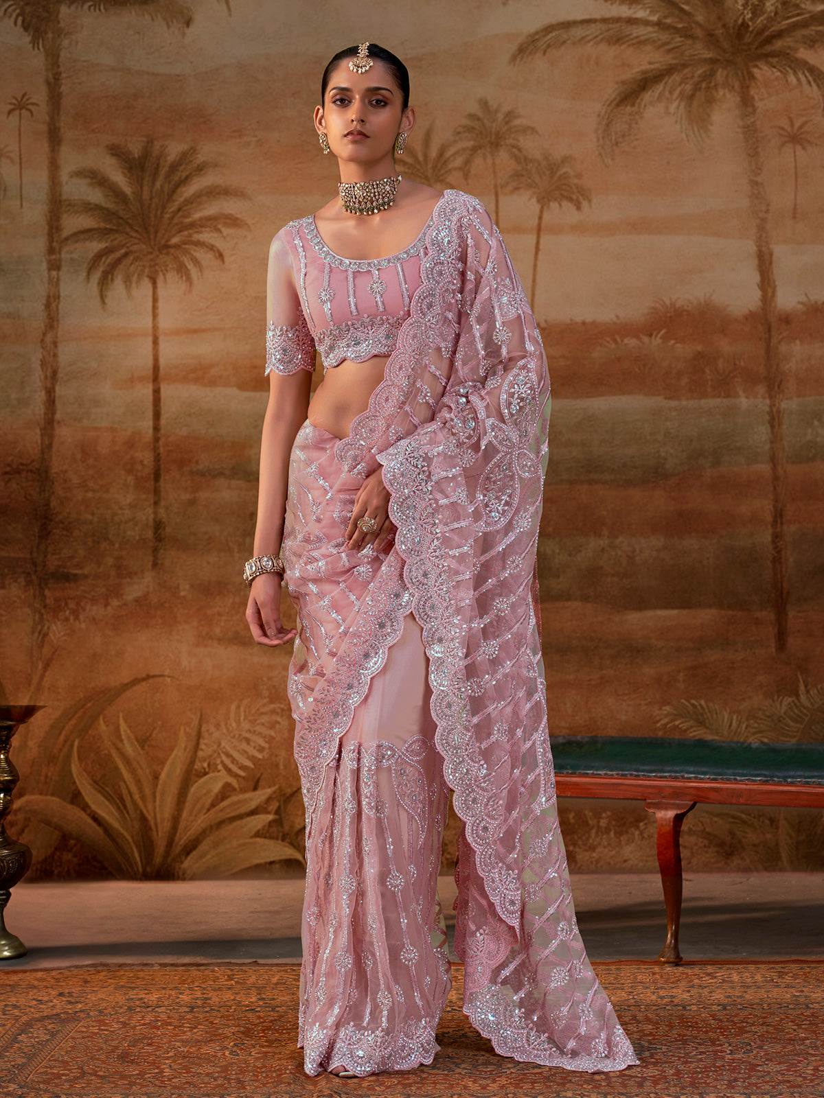 Pink net womens embellished saree with unstitched blouse