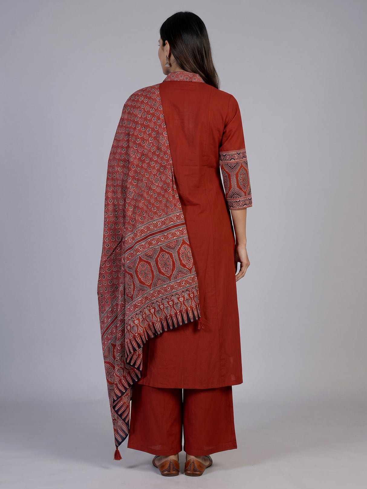 Rust red cotton blend anarkali kurti set with festive embellishments