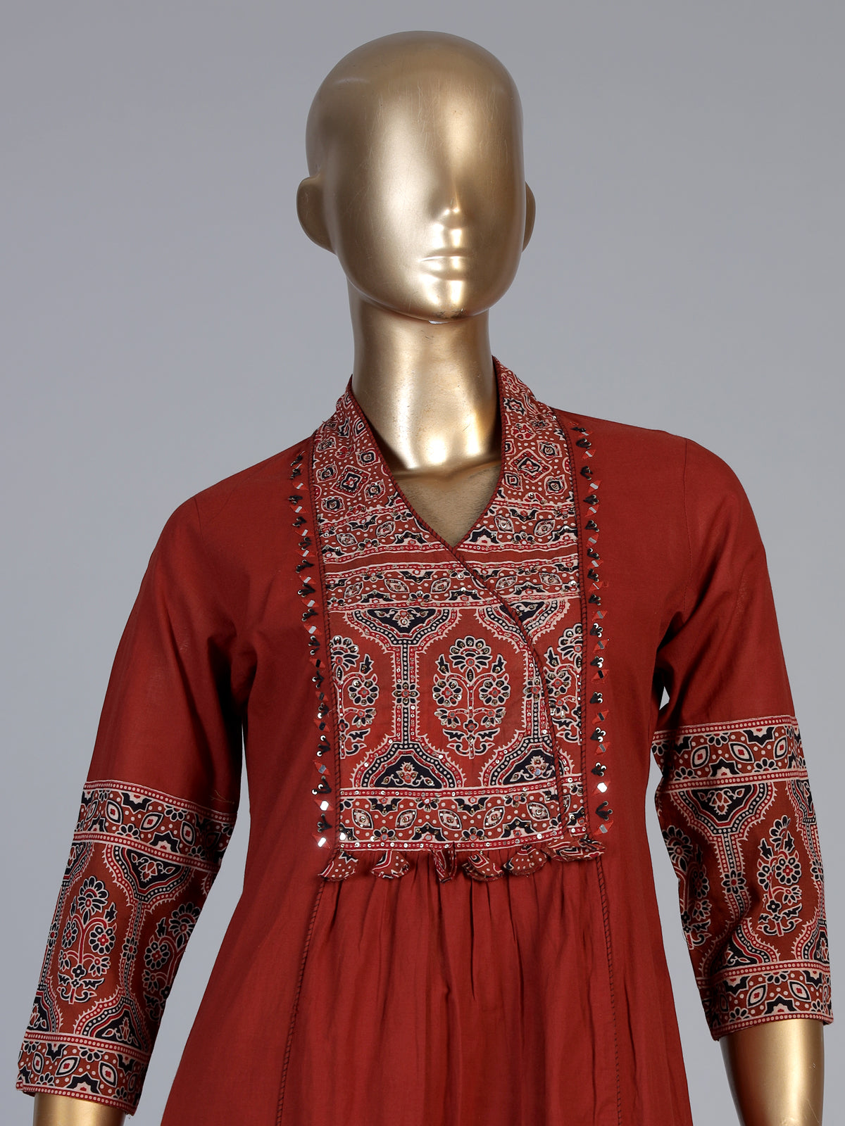 Rust red cotton blend anarkali kurti set with festive embellishments