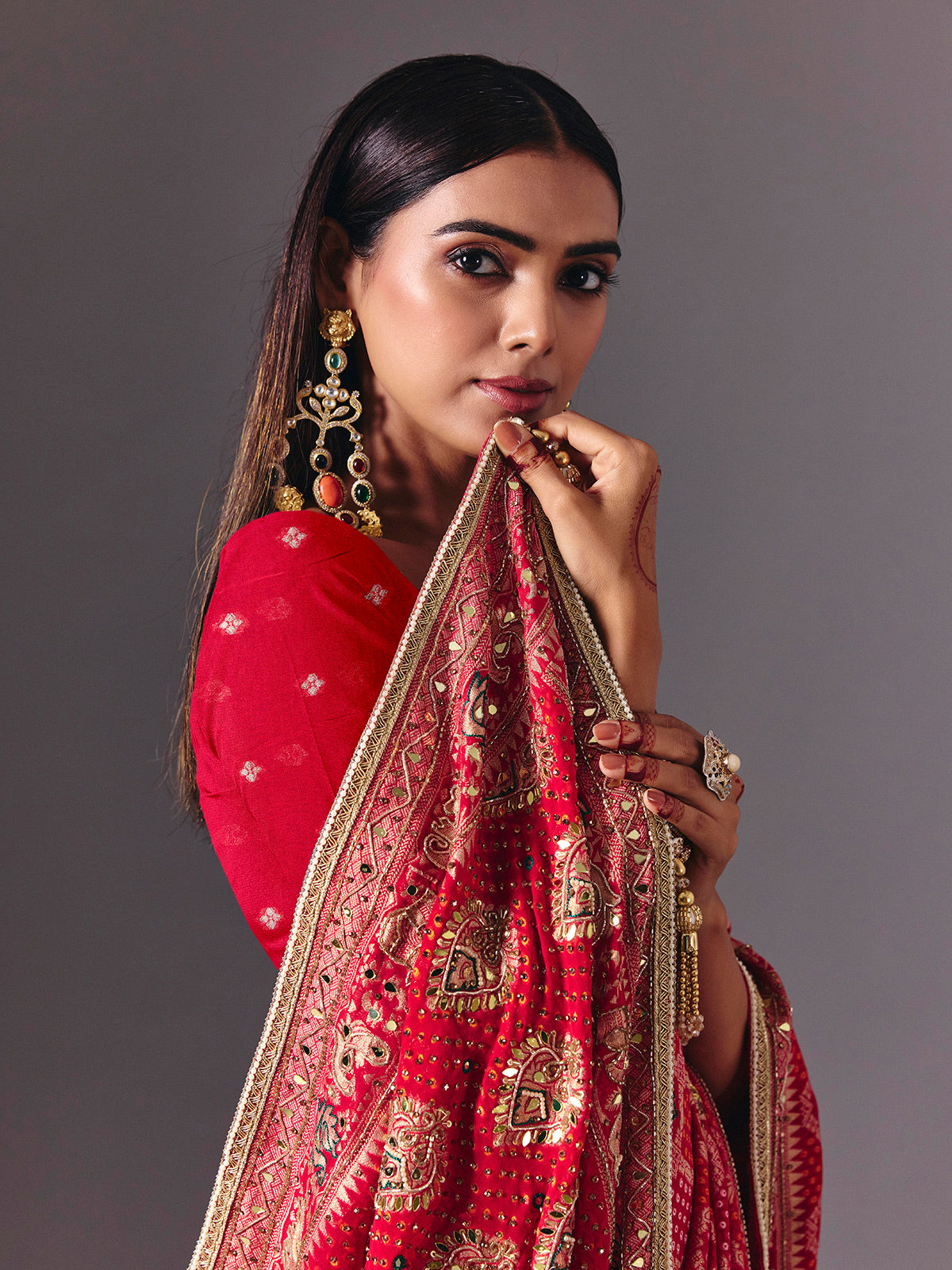 Rani pink georgette saree with bird motif elegance