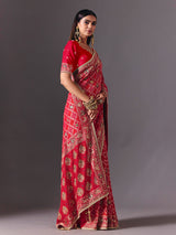 Rani pink georgette saree with bird motif elegance