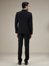 Black textured double breasted coat suit with chain detail