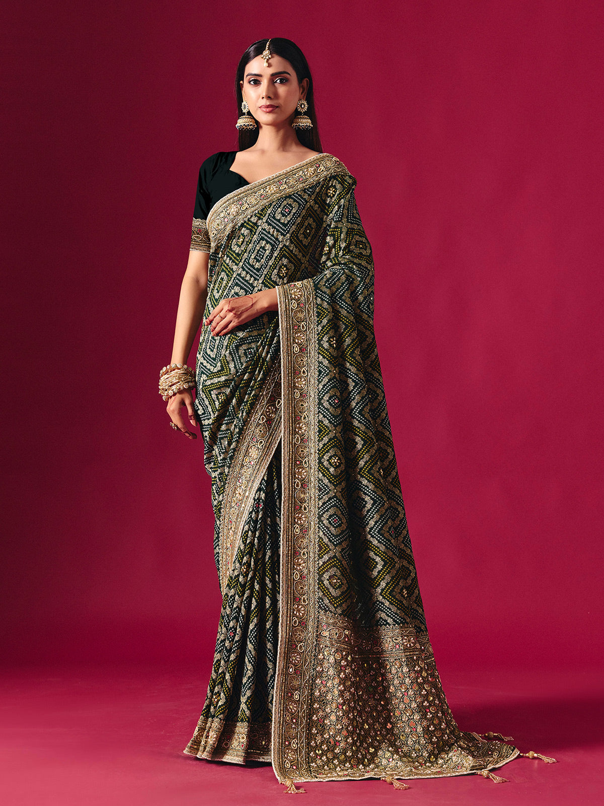 Green georgette saree with festive embellishments