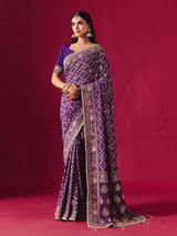 Purple georgette saree with elegant bandhani artistry