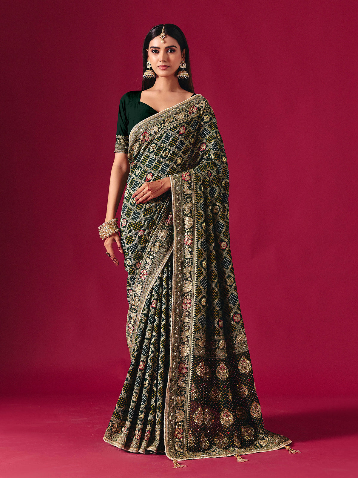 Green georgette saree with traditional handcrafted detailing