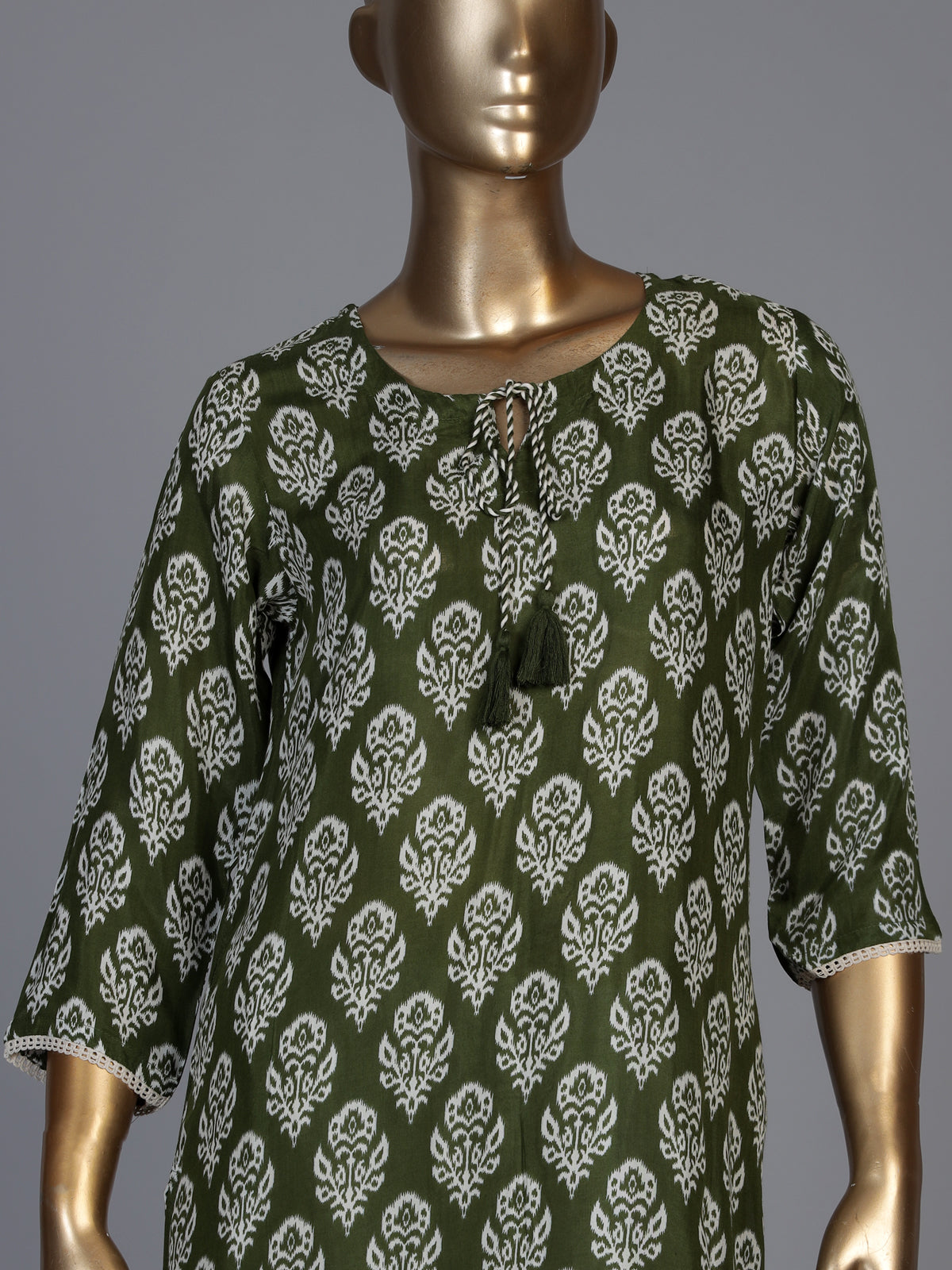 Graceful mehendi green silk kurti set with intricate cutwork