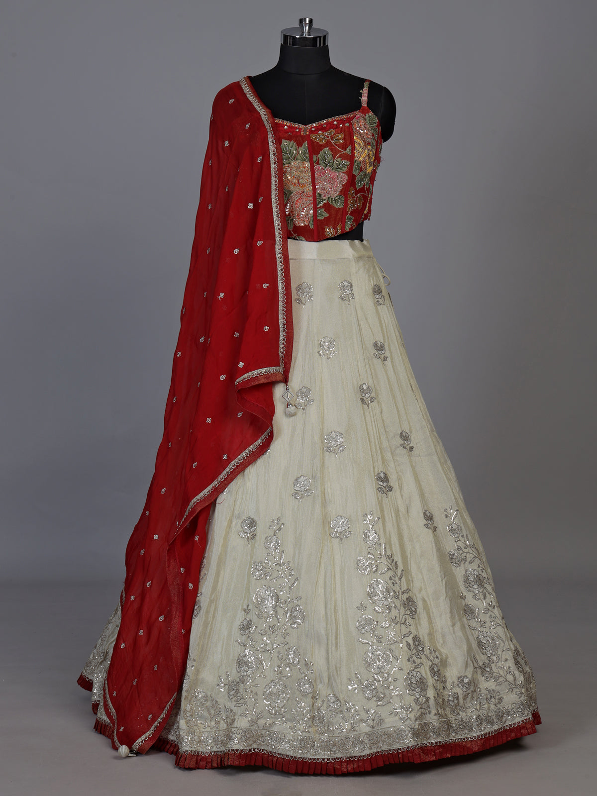 Stunning red silk lehenga choli with resham and diamond embellishments