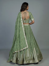 Pista green zari embellished women’s georgette lehenga choli