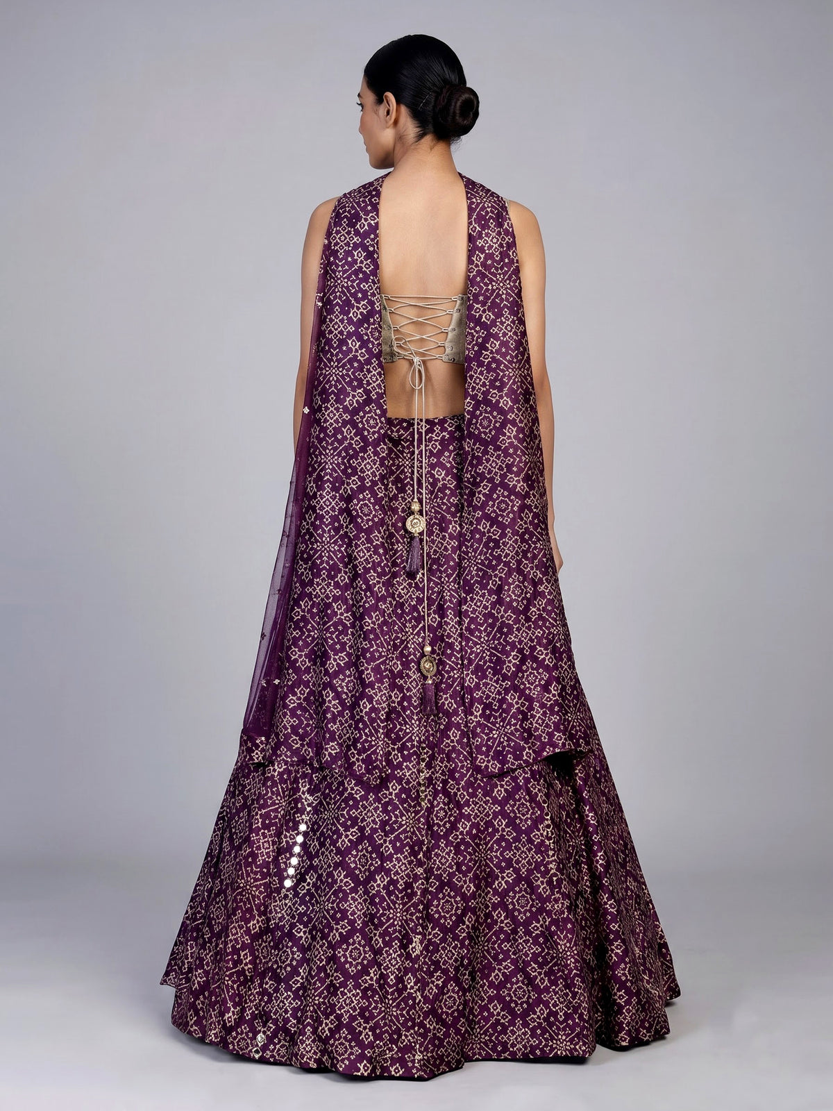 Purple bandhani mirror embellished women’s silk lehenga choli