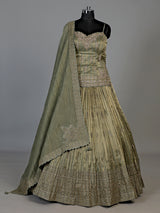 Green zardosi embellished women’s shimmer silk lehenga choli