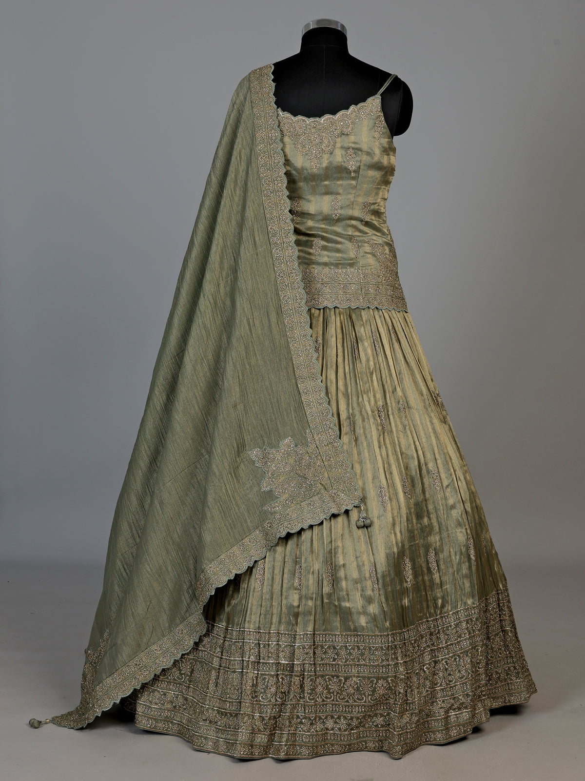 Green zardosi embellished women’s shimmer silk lehenga choli