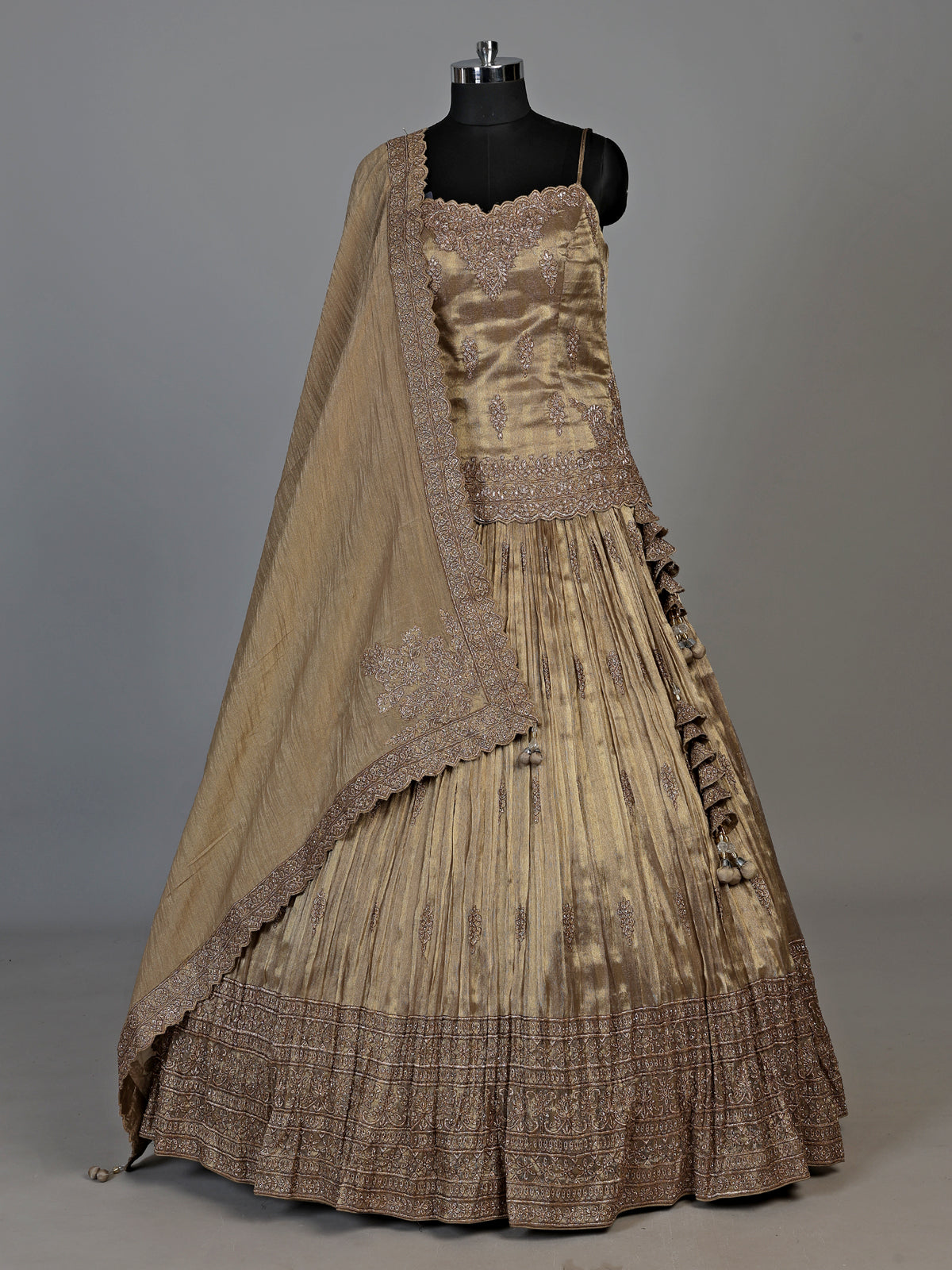Golden zardosi embellished women’s shimmer silk lehenga choli