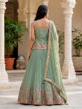Green aabla zari embellished women’s shimmer silk lehenga choli