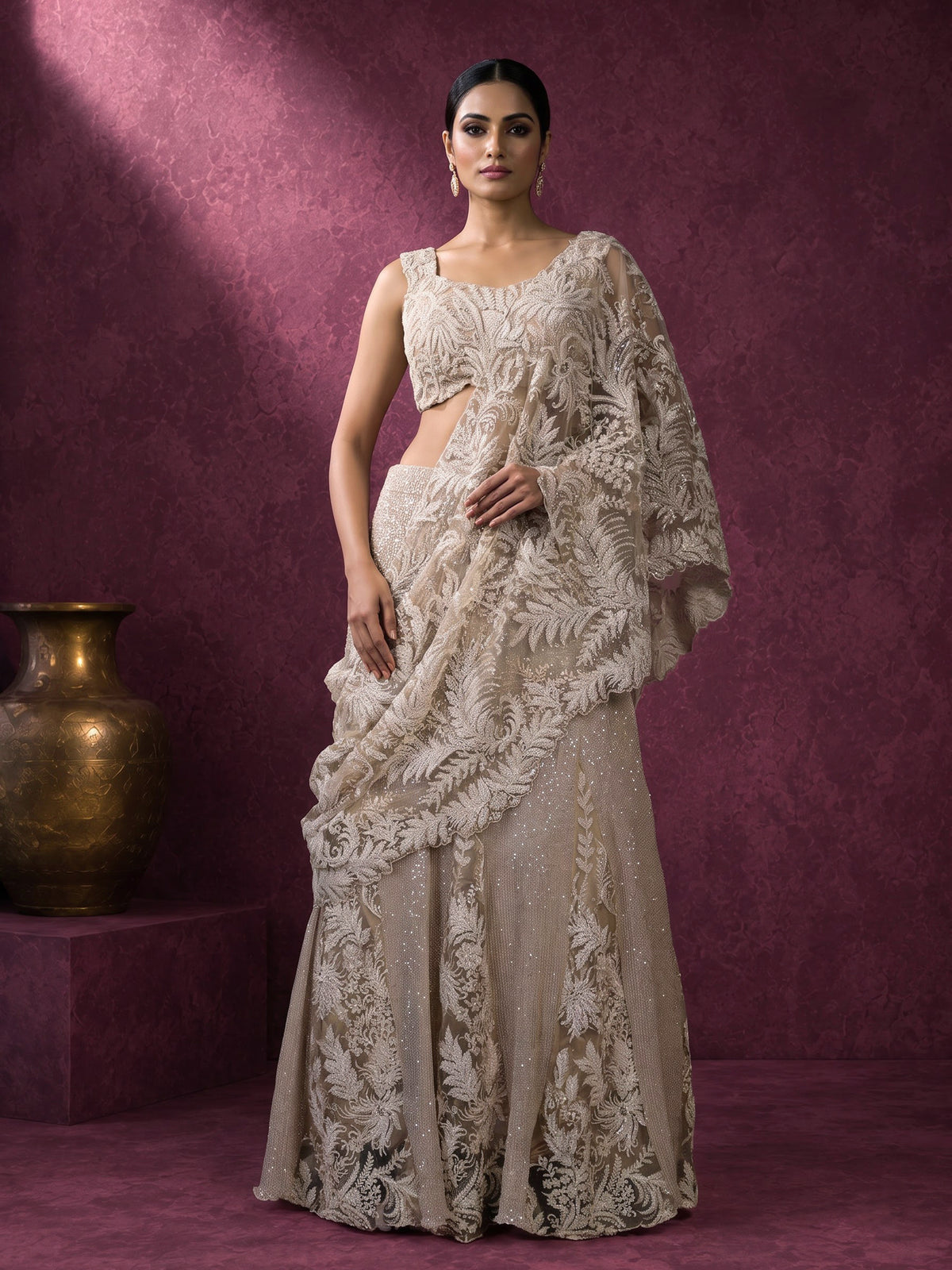 Light wine embroidered designer women’s net lehenga choli
