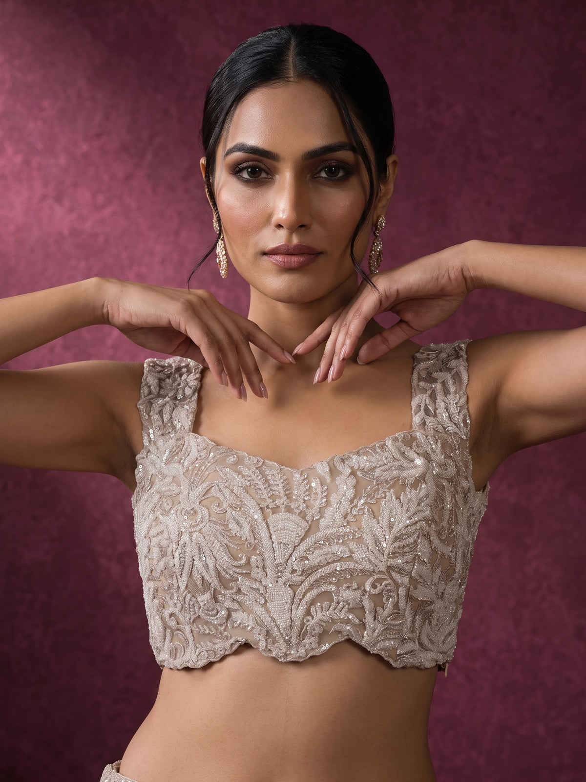 Light wine embroidered designer women’s net lehenga choli