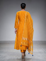 Mustard yellow silk anarkali suit with embellished dupatta