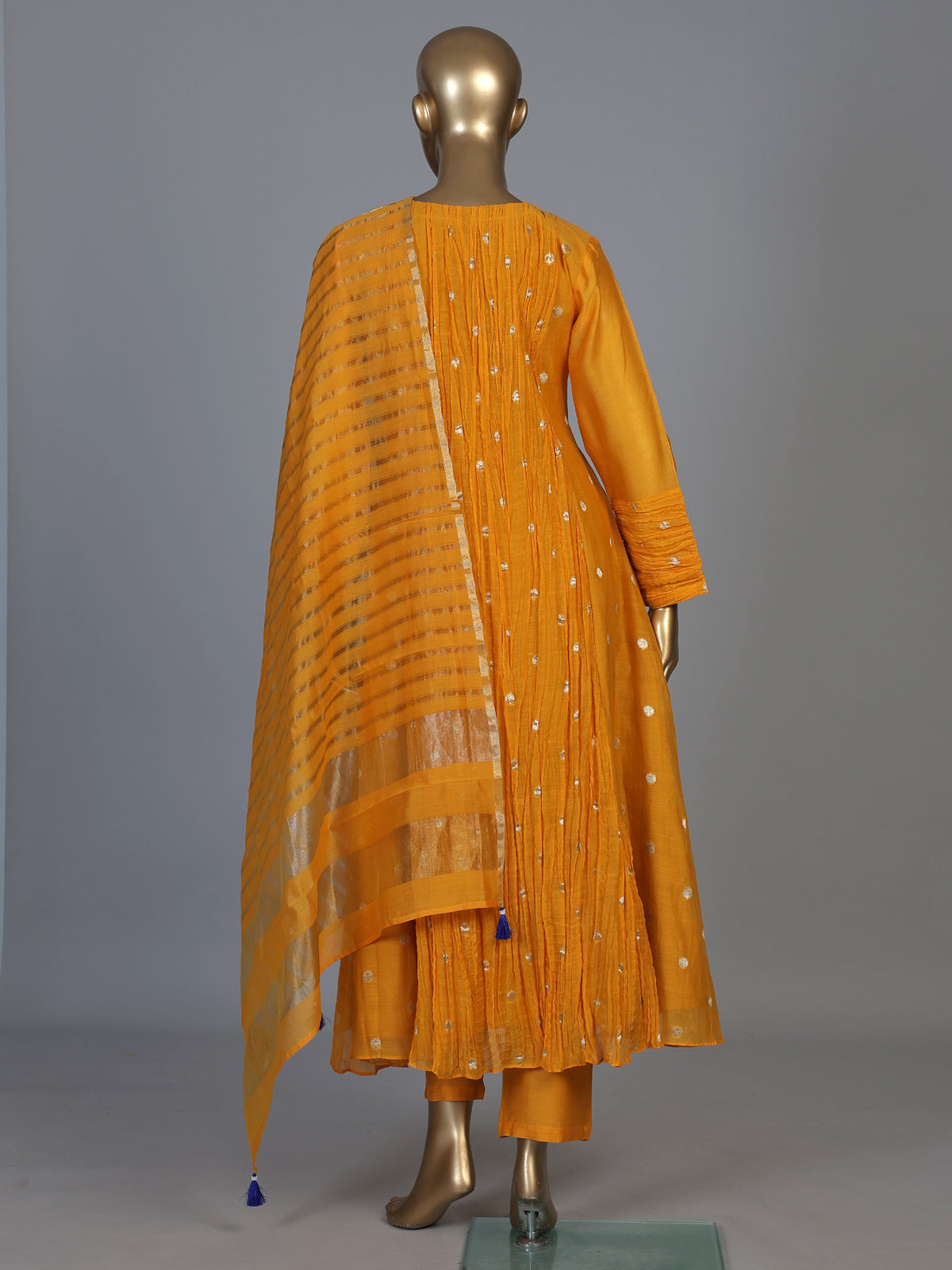 Mustard yellow silk anarkali suit with embellished dupatta
