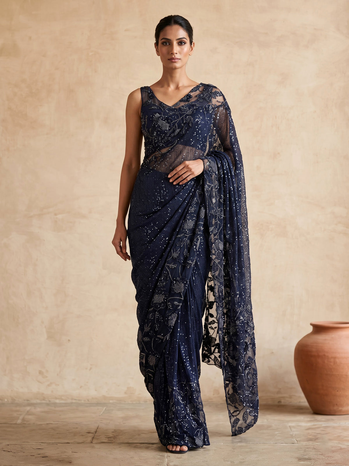 Blue net embroidered designer saree with embellished detailing