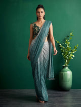 Green shaded sequin fabric saree with embellished tassel pallu