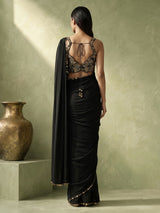Black silk designer saree with elegant coin embellishments