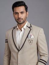 Beige terry rayon blazer for men with black piping accents