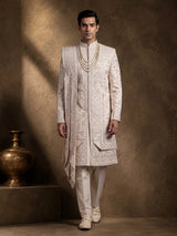 Off white raw silk sherwani for men with heavy zardosi