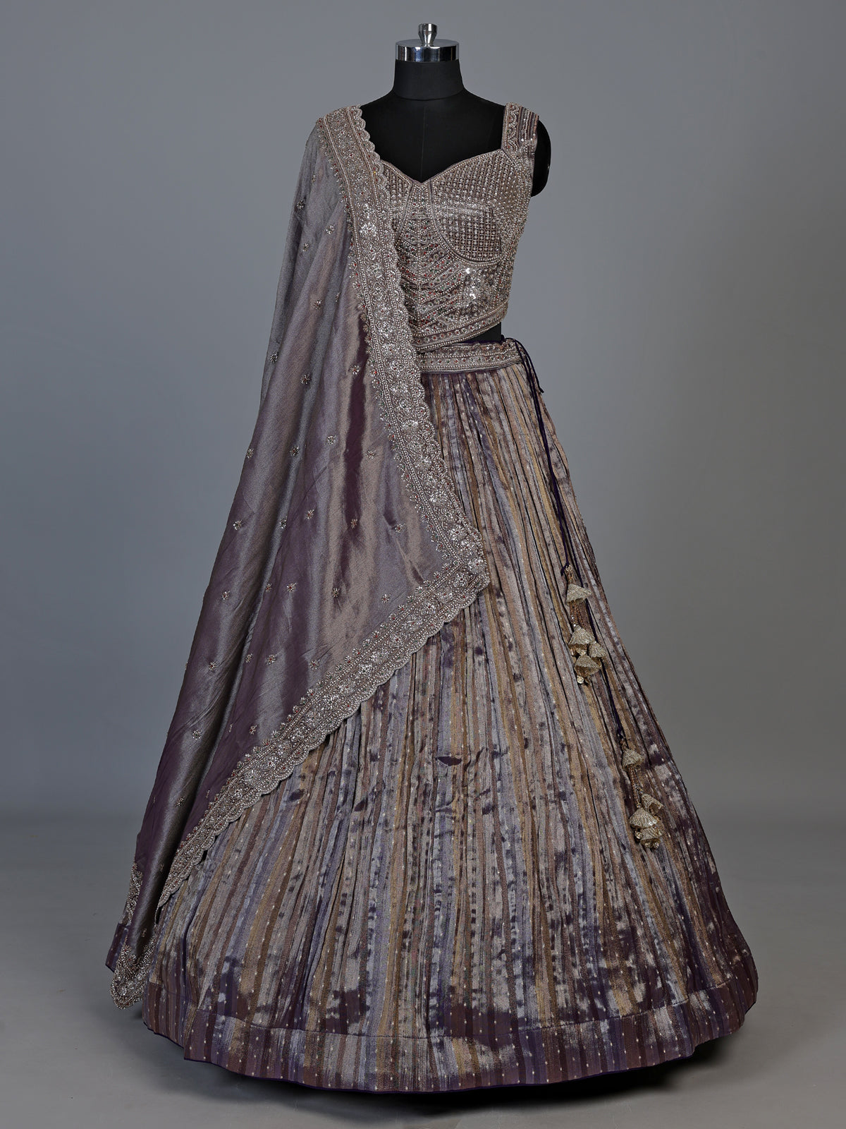 Pastel purple tissue silk lehenga choli with elegant dupatta