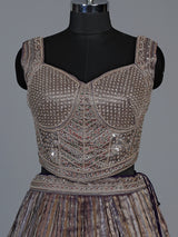 Pastel purple tissue silk lehenga choli with elegant dupatta