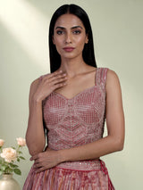 Pastel pink tissue silk lehenga choli with embellished dupatta