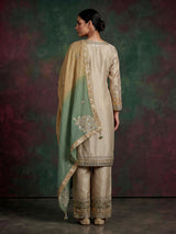 Beige chanderi silk salwar suit with green shaded dupatta