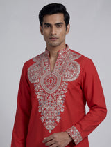 Orange silk blend mens kurta suit with floral neck style